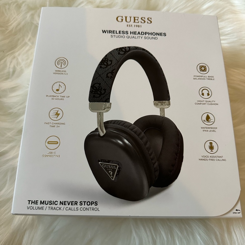 Guess wireless headphones. Studio quality sound. Brand New.